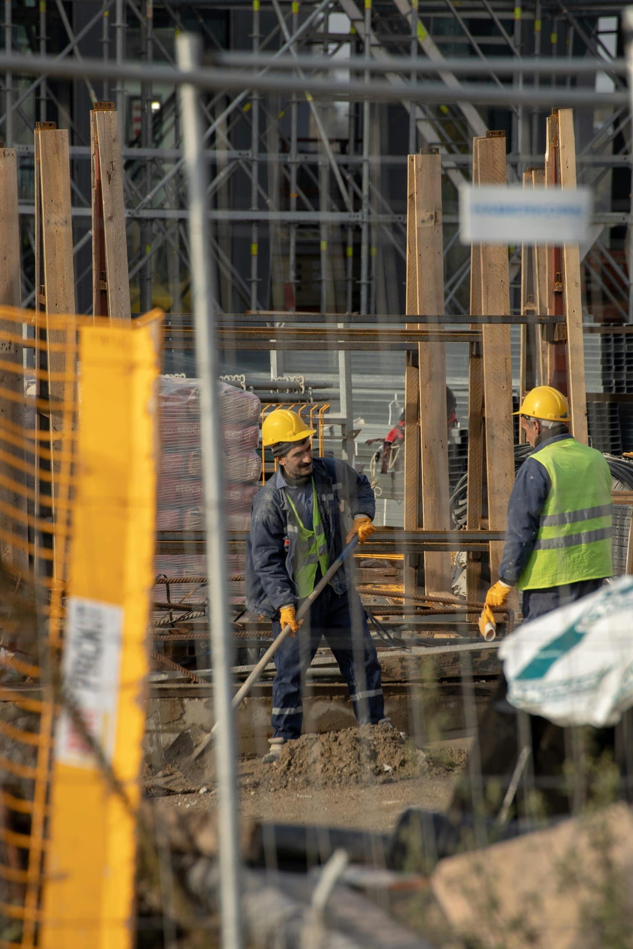 Construction crew working on framing and rebar